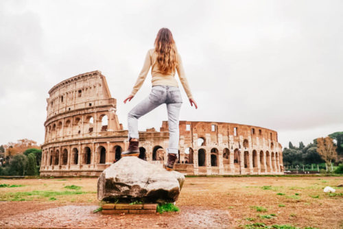 girl in front of colosseum in Rome Meg Harrell megforit.com